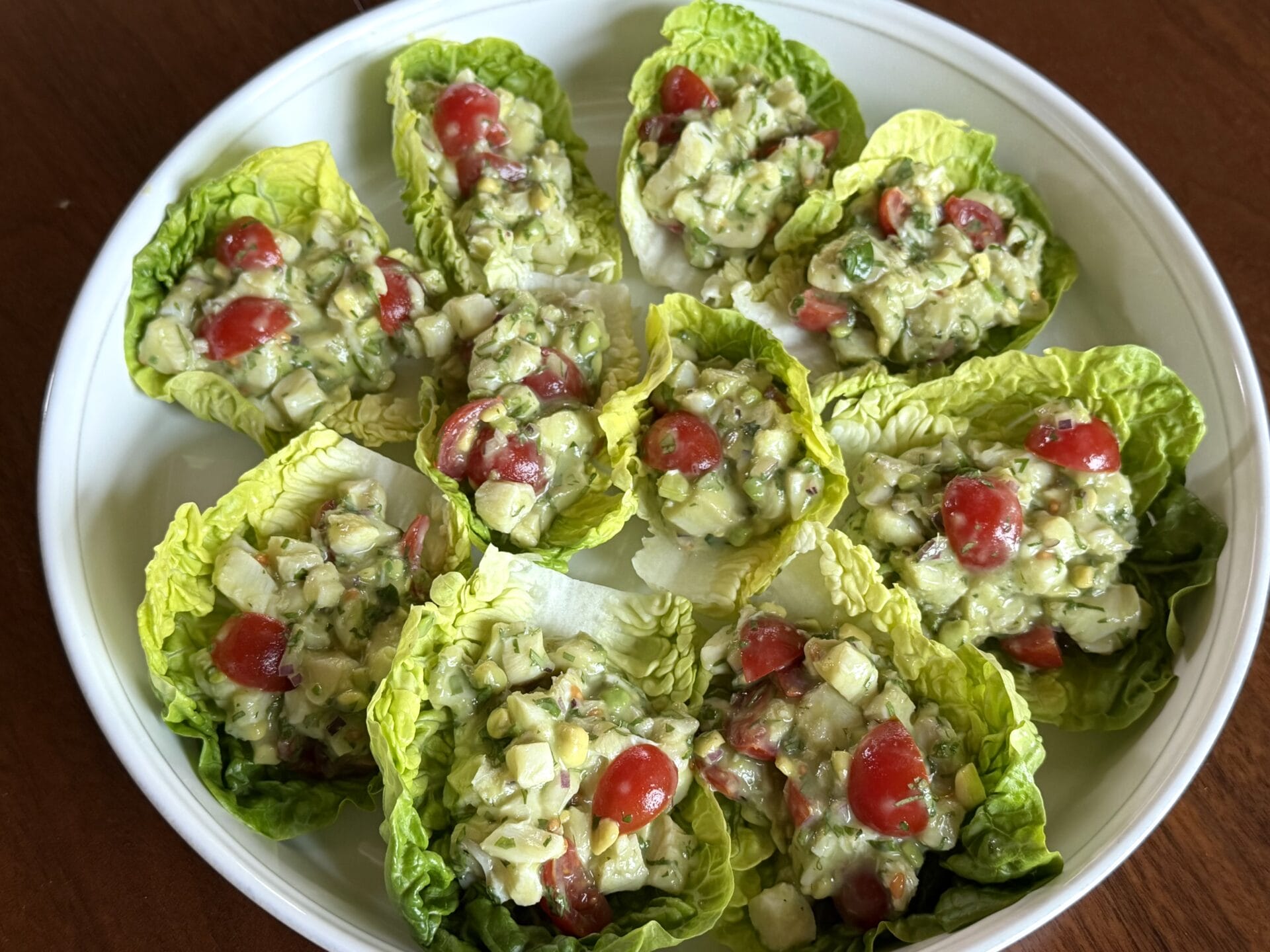 cod ceviche served in lettuce wraps